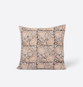 Decorative pillow with floral pattern on a white background