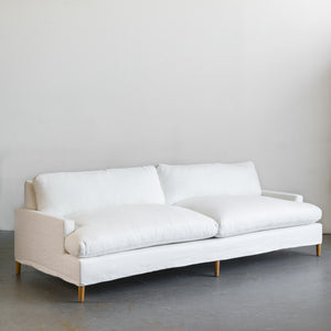 Sofá Laurel reposabrazos derecho tapizado en bouclé-Sofas-Mueble design